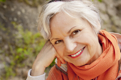 Cataract Surgery Maine Senior woman smiling after cataract surgery